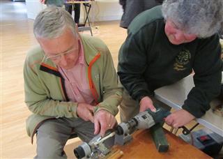 Keith helping Dawn with her pistol drill lathe